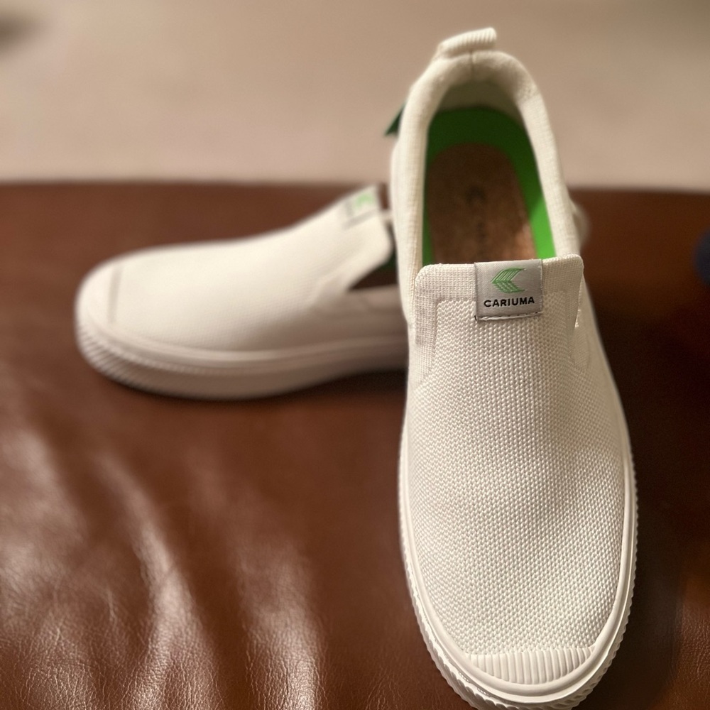 Cariuma white knit slip on sneakers